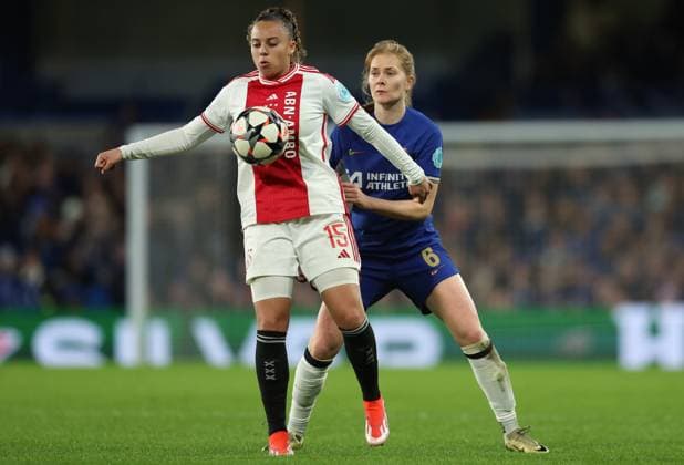 London, England, 27th March 2024. Chasity Grant of Ajax and Sjoeke Nüsken of Chelsea challenge for the ball during the UEFA Womens Champions League match at Stamford Bridge, London. Picture credit should read: Paul Terry Sportimage EDITORIAL USE ONLY. No use with unauthorised audio, video, data, fixture lists, club league logos or live services. Online in-match use limited to 120 images, no video emulation. No use in betting, games or single club league player publications. SPI-3048-0011