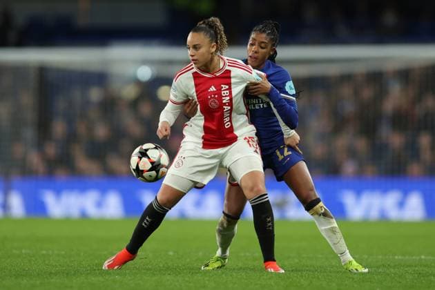 London, England, 27th March 2024. Chasity Grant of Ajax and Ashley Lawrence of Chelsea challenge for the ball challenge for the ball during the UEFA Womens Champions League match at Stamford Bridge, London. Picture credit should read: Paul Terry Sportimage EDITORIAL USE ONLY. No use with unauthorised audio, video, data, fixture lists, club league logos or live services. Online in-match use limited to 120 images, no video emulation. No use in betting, games or single club league player publications. SPI-3048-0013