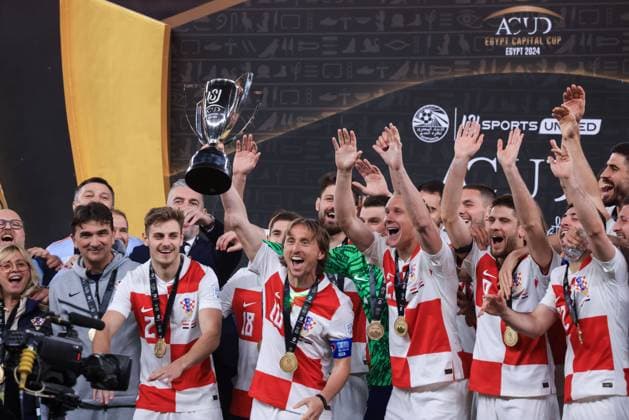 CAIRO, EGYPT - MARCH 26: Luka Modric of Croatia and his teammates celebrate with a trophy during the FIFA Series 2024 Egypt match between Croatia and Egypt at New Administrative Capital Stadium on March 26, 2024 in Cairo, Egypt. Photo by M.Bayoumy SFSI Egypt v Croatia - FIFA Series 2024 Egypt Copyright: xM.Bayoumy SFSIx