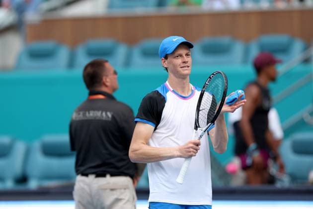 March 27, 2024, Miami Gardens, Florida, United States Of America: MIAMI GARDENS, FLORIDA - MARCH 27: Jannik Sinner of Italy defeats Tomas Machac of the Czech Republic at the net after defeating him on Day 12 of the Miami Open at Hard Rock Stadium on March 27, 2024 in Miami Gardens, Florida. ....People: Jannik Sinner Miami Open Presented by Itau 2024 - Day 12  - ZUMAs214 20240327_ada_s214_016 Copyright: xSMGx