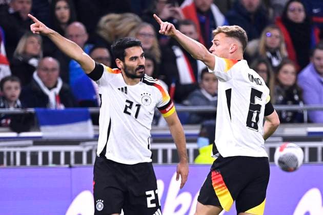 GUENDOGAN Ilkay Kapitaen Team Deutschland mit KIMMICH Joshua Laenderspiel Frankreich - Deutschland 0 : 2 am 23. 03. 2024 in Lyon DFL REGULATIONS PROHIBIT ANY USE OF PHOTOGRAPHS as IMAGE SEQUENCES and or QUASI-VIDEO Copyright: xJerryxAndrex