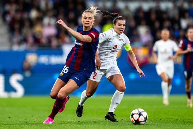 240328 Fridolina Rolfö of Barcelona and Cecilie Redisch Kvamme of Brann during the UEFA Women s Champions League quarterfinal football match between Barcelona and Brann on March 28, 2024 in Barcelona. Photo: Vegard Grott BILDBYRAN kod VG VG0589 bbeng champions league mesterligaen dam football fotball fotboll soccer barcelona barca brann kvartfinale quarter final tfk women s champions league Copyright: VEGARDxGRoTT BB240328VG027