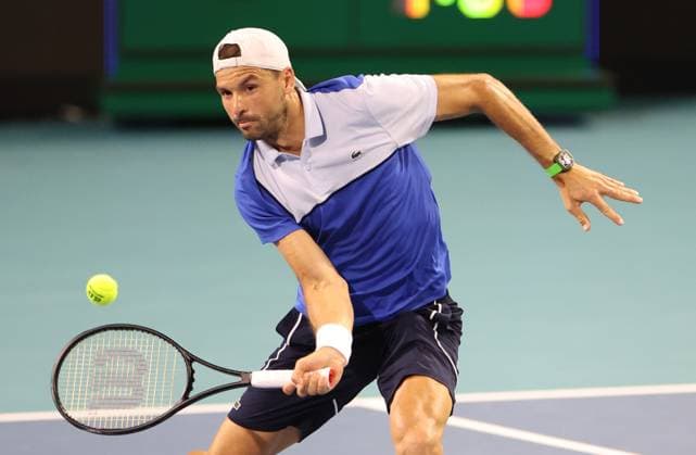 March 28, 2024, Miami Gardens, Florida, United States Of America: MIAMI GARDENS, FLORIDA - MARCH 28: Grigor Dimitrov of Bulgaria defeats Carlos Alcaraz of Spain during their match on Day 13 of the Miami Open at Hard Rock Stadium on March 28, 2024 in Miami Gardens, Florida....People: Grigor Dimitrov Miami Gardens United States Of America - ZUMAs214 20240328_ada_s214_083 Copyright: xSMGx