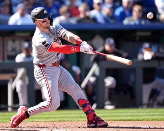 MAR 28, 2024: Minnesota Twins catcher Ryan Jeffers (27) lifts a fly ball in the third inning on opening day at Kauffman Stadium Kansas City, Missouri. CSM. Kansas City United States - ZUMAc04_ 20240328_zma_c04_025 Copyright: xJonxRobichaudx