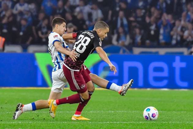 30.03.2024, xlakx, Fussball 2. Bundesliga, Hertha BSC - 1.FC Nuernberg emspor, v.l. Ibrahim Maza (Hertha BSC 30),Jan Gyamerah (1.FC Nuenberg 28),Zweikampf, Duell, Kampf, tackle (DFL DFB REGULATIONS PROHIBIT ANY USE OF PHOTOGRAPHS as IMAGE SEQUENCES and or QUASI-VIDEO) Berlin