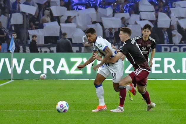 30.03.2024, xlakx, Fussball 2. Bundesliga, Hertha BSC - 1.FC Nuernberg emspor, v.l. Jeremy Dudziak (Hertha BSC 19),Florian Flick (1.FC Nuenberg 6),Zweikampf, Duell, Kampf, tackle (DFL DFB REGULATIONS PROHIBIT ANY USE OF PHOTOGRAPHS as IMAGE SEQUENCES and or QUASI-VIDEO) Berlin