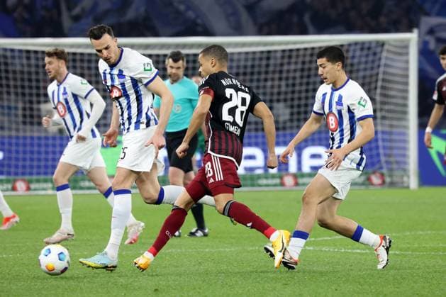 DEU, DFL, 2. FBL, Hertha BSC vs. 1.FC Nuernberg, 30.03.2024, Berliner Olympiastadion, Berlin, DEU, DFL, 2. FBL, Hertha BSC vs. 1.FC Nuernberg, im Bild Haris Tabakovic (Hertha BSC Berlin 25), Ibrahim Maza (Hertha BSC Berlin 30), Jan Gyamerah (1.FC Nuernberg 28) DFL - regulations prohibit any use of Photographs as image sequences and or quasi-video Foto: Juergen Engler nordphoto GmbH