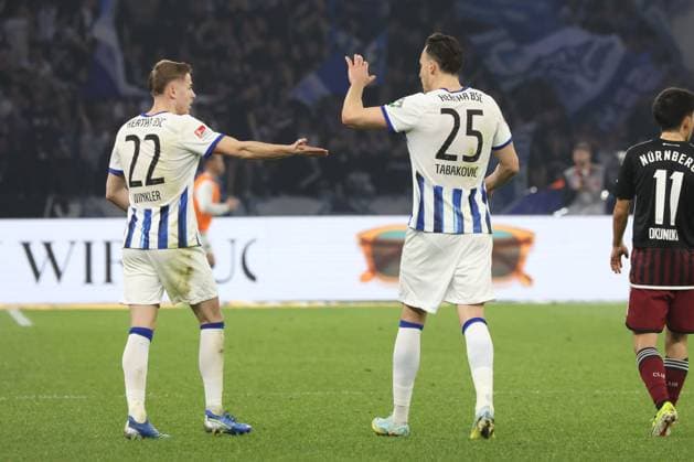 DEU, DFL, 2. FBL, Hertha BSC vs. 1.FC Nuernberg, 30.03.2024, Berliner Olympiastadion, Berlin, DEU, DFL, 2. FBL, Hertha BSC vs. 1.FC Nuernberg, im Bild nach dem 1:2 von Marten Winkler (Hertha BSC Berlin 22), Haris Tabakovic (Hertha BSC Berlin 25) DFL - regulations prohibit any use of Photographs as image sequences and or quasi-video Foto: Juergen Engler nordphoto GmbH