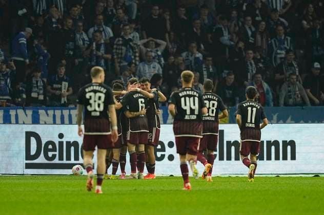 Germany, Berlin, 30.03.2024, Olympic Stadium, Hertha BSC vs 1.FC Nürnberg - 2. Bundesliga, Lukas Schleimer (1.FC Nürnberg) celebrates the teams second goal Berlin Olympic Stadium Berlin Germany