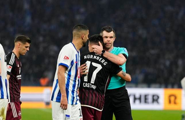 Germany, Berlin, 30.03.2024, Olympic Stadium, Hertha BSC vs 1.FC Nürnberg - 2. Bundesliga, Jens Castrop (1.FC Nürnberg) and Alexander Sather. looks on Berlin Olympic Stadium Berlin Germany