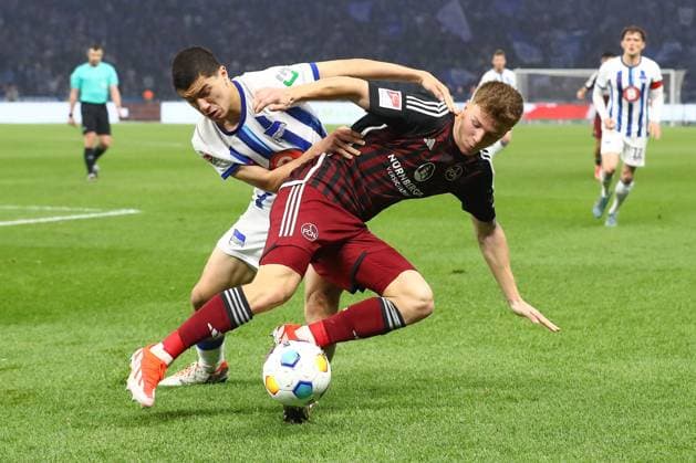 30.03.2024, xtgx, Fussball - 2.Bundesliga, Hertha BSC Berlin - 1.FC Nuernberg emspor, v.l. Ibrahim Maza (Hertha, 30), Finn Jeltsch (Nuernberg, 44) Zweikampf, Duell, Kampf, tackle (DFL DFB REGULATIONS PROHIBIT ANY USE OF PHOTOGRAPHS as IMAGE SEQUENCES and or QUASI-VIDEO) Berlin