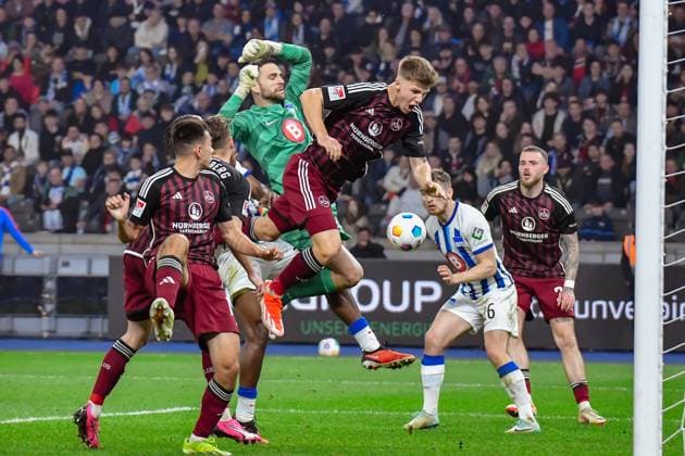 30.03.2024, xlakx, Fussball 2. Bundesliga, Hertha BSC - 1.FC Nuernberg emspor, v.l.Erik Wekesser (1.FC Nuenberg 13),Torchance (DFL DFB REGULATIONS PROHIBIT ANY USE OF PHOTOGRAPHS as IMAGE SEQUENCES and or QUASI-VIDEO) Berlin