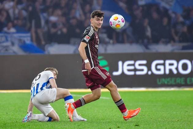 30.03.2024, xlakx, Fussball 2. Bundesliga, Hertha BSC - 1.FC Nuernberg emspor, v.l. Gustav Christensen (Hertha BSC 26),Can Yilmaz Uzun (1.FC Nuenberg 42),Zweikampf, Duell, Kampf, tackle (DFL DFB REGULATIONS PROHIBIT ANY USE OF PHOTOGRAPHS as IMAGE SEQUENCES and or QUASI-VIDEO) Berlin