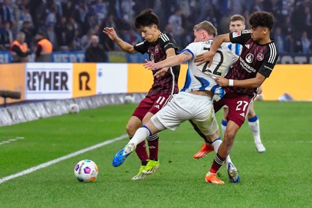 30.03.2024, xlakx, Fussball 2. Bundesliga, Hertha BSC - 1.FC Nuernberg emspor, v.l. Kanji Okunuki (1.FC Nuenberg 11),Marten Winkler (Hertha BSC 22),Nathaniel Brown (1.FC Nuenberg 27),Zweikampf, Duell, Kampf, tackle (DFL DFB REGULATIONS PROHIBIT ANY USE OF PHOTOGRAPHS as IMAGE SEQUENCES and or QUASI-VIDEO) Berlin