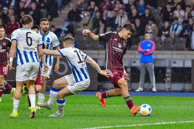 30.03.2024, xlakx, Fussball 2. Bundesliga, Hertha BSC - 1.FC Nuernberg emspor, v.l.Michal Karbownik (Hertha BSC 6),Aymen Barkok (Hertha BSC 18),Jonjoe Kenny (Hertha BSC 16),Tor zum 1:3 durch Can Yilmaz Uzun (1.FC Nuenberg 42) (DFL DFB REGULATIONS PROHIBIT ANY USE OF PHOTOGRAPHS as IMAGE SEQUENCES and or QUASI-VIDEO) Berlin