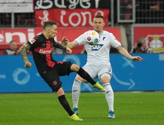 GER, 1.FBL, Bayer Leverkusen vs TSG Hoffenheim 30.03.2024, BayArena, Leverkusen, GER, 1.FBL, Bayer Leverkusen vs TSG Hoffenheim , DFL regulations prohibit any use of photographs as image sequences and or quasi-video. im Bild Alejandro Grimaldo (Leverkusen), Pavel Kaderabek (Hoffenheim) Leverkusen BayArena Deutschland