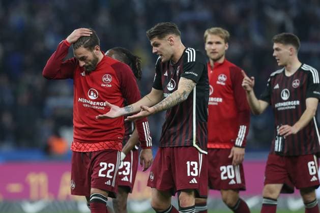 30.03.2024, xtgx, Fussball - 2.Bundesliga, Hertha BSC Berlin - 1.FC Nuernberg emspor, v.l. Enrico Valentini (Nuernberg, 22), Erik Wekesser (Nuernberg, 13) enttaeuscht, schaut enttaeuscht, niedergeschlagen, disappointed (DFL DFB REGULATIONS PROHIBIT ANY USE OF PHOTOGRAPHS as IMAGE SEQUENCES and or QUASI-VIDEO) Berlin