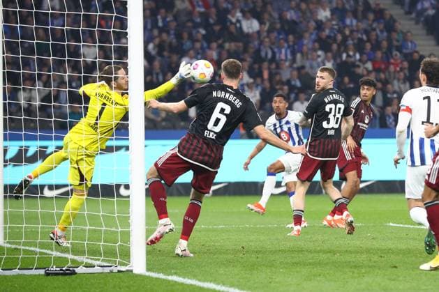 30.03.2024, xtgx, Fussball - 2.Bundesliga, Hertha BSC Berlin - 1.FC Nuernberg emspor, v.l. Oliver Christensen (Hertha, 1) Parade, haelt den Ball, faengt den Ball, pariert (DFL DFB REGULATIONS PROHIBIT ANY USE OF PHOTOGRAPHS as IMAGE SEQUENCES and or QUASI-VIDEO) Berlin