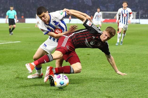 30.03.2024, xtgx, Fussball - 2.Bundesliga, Hertha BSC Berlin - 1.FC Nuernberg emspor, v.l. Ibrahim Maza (Hertha, 30), Finn Jeltsch (Nuernberg, 44) Zweikampf, Duell, Kampf, tackle (DFL DFB REGULATIONS PROHIBIT ANY USE OF PHOTOGRAPHS as IMAGE SEQUENCES and or QUASI-VIDEO) Berlin
