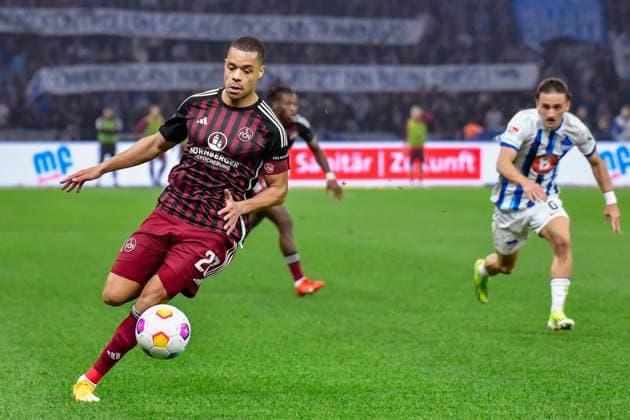 30.03.2024, xlakx, Fussball 2. Bundesliga, Hertha BSC - 1.FC Nuernberg emspor, v.l.Jan Gyamerah (1.FC Nuenberg 28),Michal Karbownik (Hertha BSC 6),Zweikampf, Duell, Kampf, tackle (DFL DFB REGULATIONS PROHIBIT ANY USE OF PHOTOGRAPHS as IMAGE SEQUENCES and or QUASI-VIDEO) Berlin