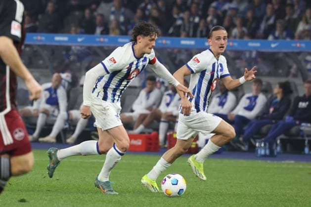 DEU, DFL, 2. FBL, Hertha BSC vs. 1.FC Nuernberg, 30.03.2024, Berliner Olympiastadion, Berlin, DEU, DFL, 2. FBL, Hertha BSC vs. 1.FC Nuernberg, im Bild Fabian Reese (Hertha BSC Berlin 11), Michal Karbownik (Hertha BSC Berlin 6) DFL - regulations prohibit any use of Photographs as image sequences and or quasi-video Foto: Juergen Engler nordphoto GmbH
