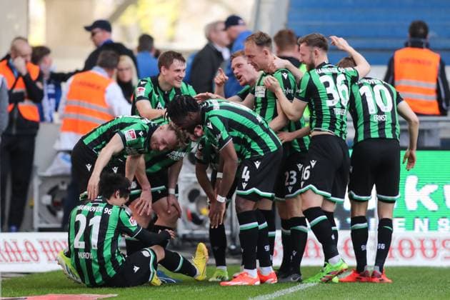 Torjubel - Torschütze Sei Muroya (Hannover 96,21) trifft zum 0-2 - 2. Fußball Bundesliga Saison 2023-2024 1. FC Magdeburg vs. Hannover 96 in der MDCC Arena in Magdeburg - Aktion,Fußball,Mann,Männer,Deutschland,31.03.2024