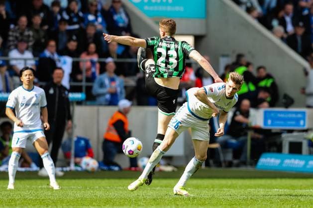 Luca Schuler (1. FC Magdeburg,26) gegen Marcel Halstenberg (Hannover 96,23) - 2. Fußball Bundesliga Saison 2023-2024 1. FC Magdeburg vs. Hannover 96 in der MDCC Arena in Magdeburg - Aktion,Fußball,Mann,Männer,Deutschland,31.03.2024