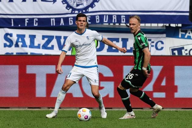 Tobias Müller (1. FC Magdeburg,21) gegen Havard Nielsen (Hannover 96,16) - 2. Fußball Bundesliga Saison 2023-2024 1. FC Magdeburg vs. Hannover 96 in der MDCC Arena in Magdeburg - Aktion,Fußball,Mann,Männer,Deutschland,31.03.2024