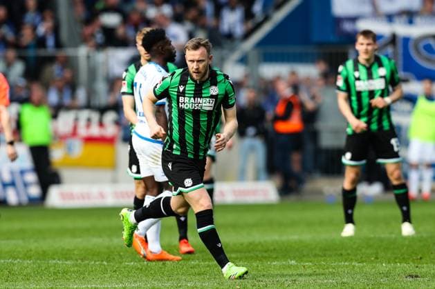 Cedric Teuchert (Hannover 96,36) - 2. Fußball Bundesliga Saison 2023-2024 1. FC Magdeburg vs. Hannover 96 in der MDCC Arena in Magdeburg - Aktion,Fußball,Mann,Männer,Deutschland,31.03.2024