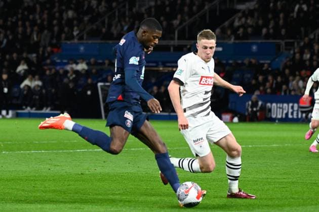 Ousmane DEMBELE ( 10 - PSG ) and Adrien Truffert ( 3 - Rennes ) during the French Cup match between Paris Saint Germain and Stade Rennais at Parc des Princes on April 03, 2024 in Paris, France. ( Photo by federico pestellini panoramic ) - FOOTBALL : PSG vs Rennes - Coupe de France - 03 04 2024 FedericoPestellini Panoramic 