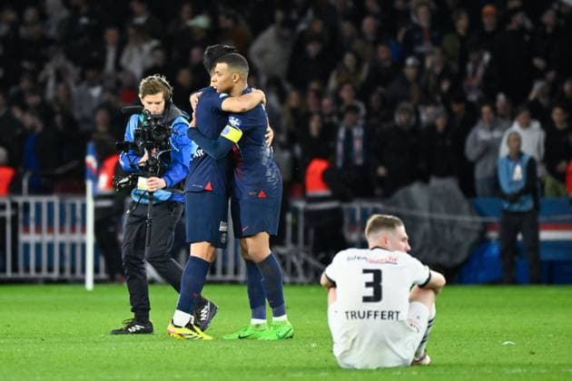 Kylian Mbappe ( 7 - PSG ) and Asensio Marco ( 11 - PSG ) celebrate following the French Cup match between Paris Saint Germain and Stade Rennais at Parc des Princes on April 03, 2024 in Paris, France. ( Photo by federico pestellini panoramic ) - FOOTBALL : PSG vs Rennes - Coupe de France - 03 04 2024 FedericoPestellini Panoramic 