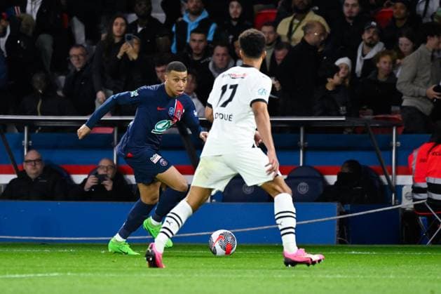 Kylian Mbappe ( 7 - PSG ) and Doue Guela ( 17 - Rennes ) during the French Cup match between Paris Saint Germain and Stade Rennais at Parc des Princes on April 03, 2024 in Paris, France. ( Photo by federico pestellini panoramic ) - FOOTBALL : PSG vs Rennes - Coupe de France - 03 04 2024 FedericoPestellini Panoramic 