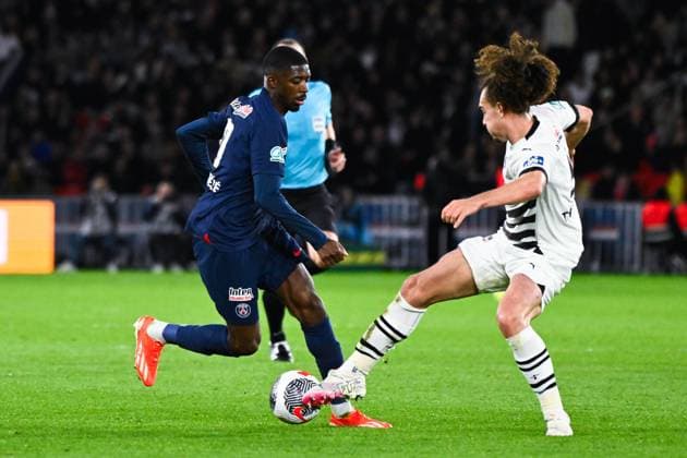Ousmane DEMBELE ( 10 - PSG ) and Arthur THEATE ( 5 - Rennes ) during the French Cup match between Paris Saint Germain and Stade Rennais at Parc des Princes on April 03, 2024 in Paris, France. ( Photo by federico pestellini panoramic ) - FOOTBALL : PSG vs Rennes - Coupe de France - 03 04 2024 FedericoPestellini Panoramic 