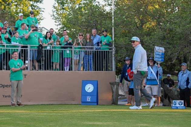 SAN ANTONIO, TX - APRIL 04: Charley Hoffman (USA) reacts to a sea of green tee shirts commemorating his 500th PGA, Golf Herren Tour career start during Rd1 of the Valero Texas Open at TPC San Antonio (Oaks Course) on April 4, 2024, in San Antonio, Texas. (Photo by Ken Murray Icon Sportswire) GOLF: APR 04 PGA Valero Texas Open EDITORIAL USE ONLY Icon2404040021