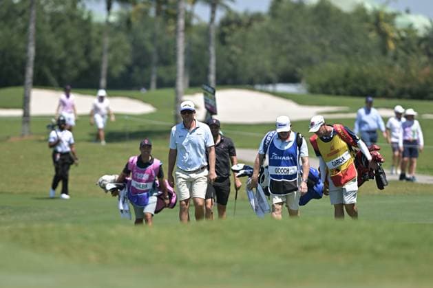 DORAL, FL - APRIL 06 Professional Golfer Talor Gooch, center, in action during LIV Golf Miami on April 6, 2024, at Trump National Doral Miami in Doral, FL. (Photo by Michele Eve Sandberg Icon Sportswire) GOLF: APR 06 LIV Golf League Miami EDITORIAL USE ONLY Icon24040637901