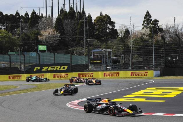 01 VERSTAPPEN Max (nld), Red Bull Racing RB20, action and 11 PEREZ Sergio (mex), Red Bull Racing RB20, action during the Formula 1 MSC Cruises Japanese Grand Prix 2024, 4th round of the 2024 Formula One World Championship, WM, Weltmeisterschaft from April 5 to 7, 2024 on the Suzuka International Racing Course, in Suzuka, Japan - F1 - JAPANESE GRAND PRIX 2024 DPPI Panoramic  240407_R04_GIAPPONE_AV6_8760