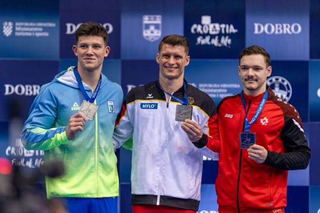 Bilder des Jahres 2024, Sport 04 April Sport Themen der Woche KW14 FIG Dobro World Cup Parallel Bars Silver Medal Illia Kovtun of Ukraine, Gold Medal Lukas Dauser of Germany and Bronze Medal Noe Seifert of Switzerland pose with their medals during FIG Dobro World Cup Parallel Bars medal ceremony at Sports arena Gradski vrt Osijek in Osijek, Croatia on April 6, 2024. BornaxJaksic PIXSELL