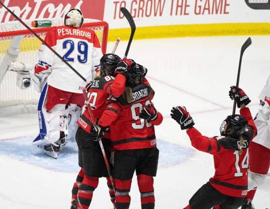 April 7, 2024, Utica, Ny, UNITED STATES: Canada s Danielle Serdachny (92) celebrates her goal against Czechia goaltender Klara Peslarova (29) with teammates during first period hockey action at the IIHF Women s World Hockey Championship in Utica, N.Y., Sunday, April 7, 2024. Canada News - April 7, 2024  - ZUMAc35_ 20240407_zaf_c35_029 Copyright: xChristinnexMuschix