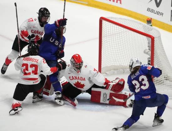 April 8, 2024, Utica, Ny, UNITED STATES: Canada goaltender Ann-Renee Desbiens (35) makes a save against United States Hannah Bilka (23) during second period hockey action at the IIHF Women s World Hockey Championship in Utica, N.Y., Monday, April 8, 2024. Canada News - April 8, 2024  - ZUMAc35_ 20240408_zaf_c35_269 Copyright: xChristinnexMuschix
