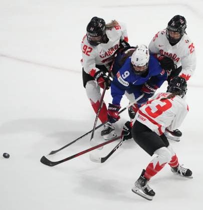April 8, 2024, Utica, Ny, UNITED STATES: Canada s Danielle Serdachny (92), Jaime Bourbonnais (25) and Kristin O Neill (43) battle with United States Kirsten Simms (9) during second period hockey action at the IIHF Women s World Hockey Championship in Utica, N.Y., Monday, April 8, 2024. Canada News - April 8, 2024  - ZUMAc35_ 20240408_zaf_c35_271 Copyright: xChristinnexMuschix