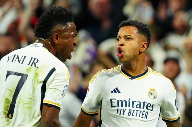 Rodrygo of Real Madrid celebrates scoring a goal after making it 2-1 with Vinicius Junior Real Madrid v Manchester City, UEFA Champions League, Quarter Final, First Leg, Football, Santiago Bernabeu Stadium, Madrid, Spain - 09 Apr 2024 EDITORIAL USE ONLY No use with unauthorised audio, video, data, fixture lists, club league logos or live services. Online in-match use limited to 120 images, no video emulation. No use in betting, games or single club league player publications. Copyright: xJavierxGarcia Shutterstockx 14424044p