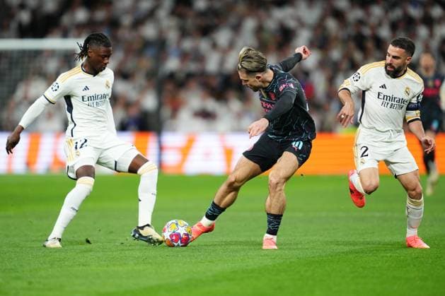 ESP: Real Madrid v Manchester City. UEFA Champions League match. Quarter-finals Jack Grealish of Manchester City and Eduardo Camavinga of Real Madrid during the UEFA Champions League match, Quarter-finals, first leg, between Real Madrid and Manchester City played at Santiago Bernabeu Stadium on April 9, 2024 in Madrid Spain. kpng Copyright: xBaguxBlancox xPRESSINPHOTOx PS_240409_005