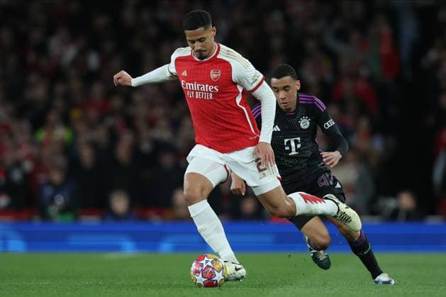 Arsenal FC v FC Bayern München: Quarter-final First Leg - UEFA Champions League 2023 24 William Saliba of Arsenal and Jamal Musiala of Bayern Munich in action during the UEFA Champions League quarter-final first leg match between Arsenal FC and FC Bayern München at Emirates Stadium on April 9, 2024 in London, England. London Emirates Stadium England United Kingdom Copyright: xEdxSykes Sportsphoto APLx 13971564
