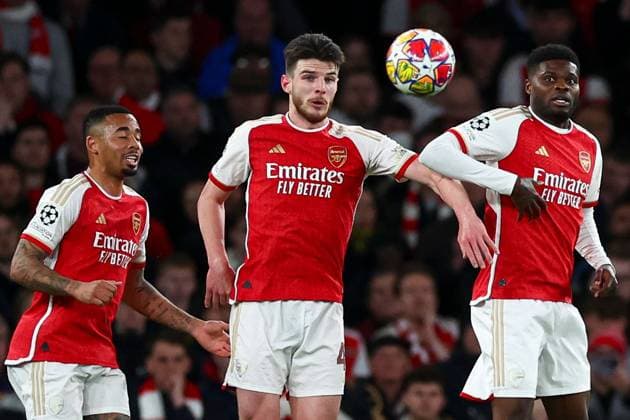 RaphaÃ«l Guerreiro of Bayern Munich takes a free-kick into the Arsenal defensive wall containing Gabriel Jesus (L), Declan Rice and Thomas Partey of Arsenal (R) Arsenal v Bayern Munich, UEFA Champions League, Quarter Final, First Leg, Football, Emirates Stadium, London, UK - 09 Apr 2024 EDITORIAL USE ONLY No use with unauthorised audio, video, data, fixture lists, club league logos or live services. Online in-match use limited to 120 images, no video emulation. No use in betting, games or single club league player publications.  Copyright: xSimonxDael Shutterstockx 14424047cp