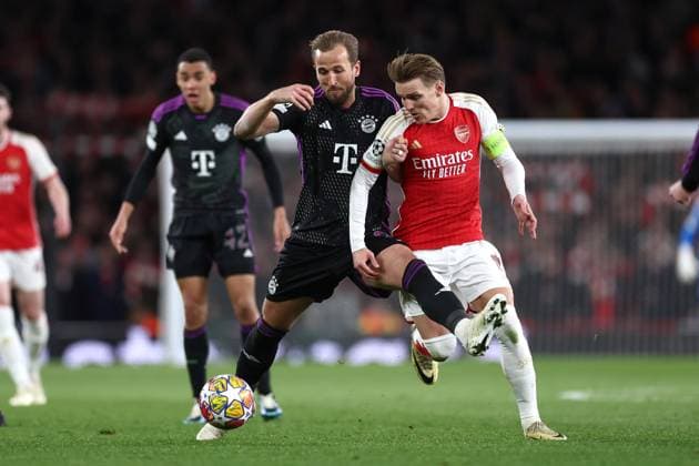 Arsenal v Bayern Munich 09 April 2024, London - UEFA Champions League - Quarter Final - First leg - Arsenal v Bayern Munich - Harry Kane of Bayern Munich and Martin Odegaard of Arsenal - Photo: Jacques Feeney Offside. London UK Copyright: xJacquesxFeeneyx xOffsidexOffside