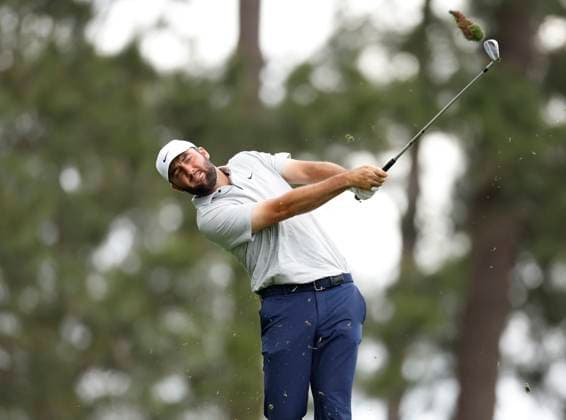 Scottie Scheffler hits his tee shot on the fourth hole during the first round of the Masters Tournament at Augusta National Golf Club in Augusta, Georgia on Thursday, April 11, 2024.  AUG20240411129 JOHNxANGELILLO