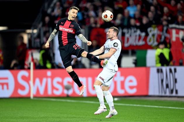 LEVERKUSEN - (l-r) Alejandro Grimaldo of Bayer 04 Leverkusen, Vladimir Coufal of West Ham United FC during the UEFA Europa League quarter-final match between Bayer 04 Leverkusen and West Ham United at the BayArena on April 11, 2024 in Leverkusen, Germany. ANP Hollandse Hoogte UEFA Europa League 2023 24 2023 2024 xVIxANPxSportx xGerritxvanxKeulenxIVx 495762933 originalFilename: 495762933.jpg