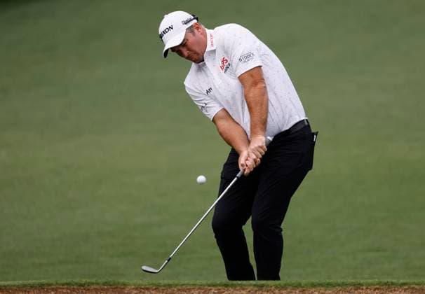 New Zealand s Ryan Fox hits a chip shot on the second hole during the first round of the Masters Tournament at Augusta National Golf Club in Augusta, Georgia on Thursday, April 11, 2024.  AUG20240411571 TANNENxMAURY