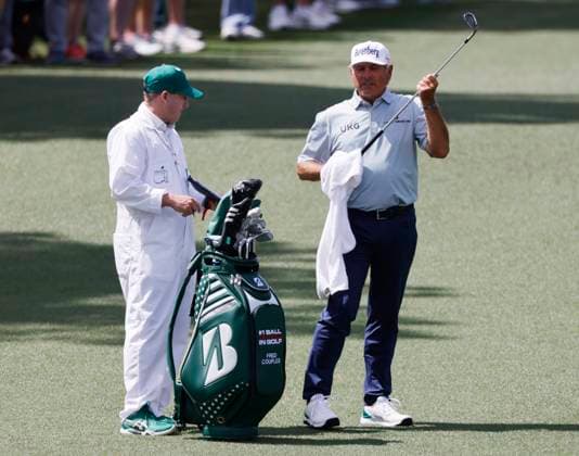 Fred Couples prepares to hit an approach shot on the second hole during the first round of the Masters Tournament at Augusta National Golf Club in Augusta, Georgia on Thursday, April 11, 2024.  AUG20240411575 TANNENxMAURY