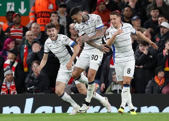 11th April 2024; Anfield, Liverpool, Merseyside, England; Europa League, Quarter Final;, First Leg Football, Liverpool versus Atalanta; Gianluca Scamacca of Atalanta celebrates with his team mates after scoring to give his side a 0-1 lead after 39 minutes  ActionPlus12628480 DavidxBlunsden